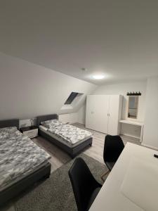 Postel nebo postele na pokoji v ubytování Fünf Täler Stern