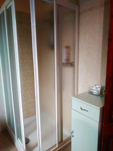a bathroom with a shower and a white cabinet at Il Tempo Dei Sogni in San Benedetto Po +99 photos