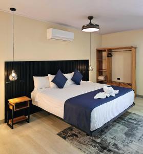 Ένα ή περισσότερα κρεβάτια σε δωμάτιο στο Calathea Hotel Monteverde