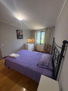 Ένα ή περισσότερα κρεβάτια σε δωμάτιο στο 4VENTI by LigurianLife