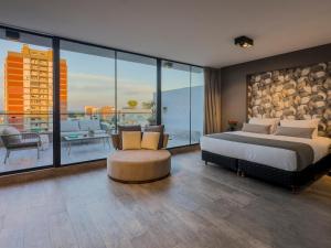 Ένα ή περισσότερα κρεβάτια σε δωμάτιο στο Casa Joseph Libertador +46 φωτογραφίες