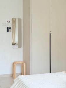 Giường trong phòng chung tại HeySnowy #Single Semi-D #Gated&Guarded #FreeNetflix #Water Dispenser #Mahjong