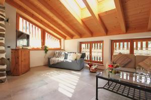 Χώρος καθιστικού στο Exclusive Chalet Maso Molini