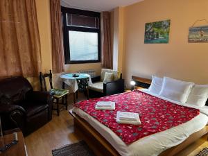 Ένα ή περισσότερα κρεβάτια σε δωμάτιο στο Studio in Hotel Flora Borovets