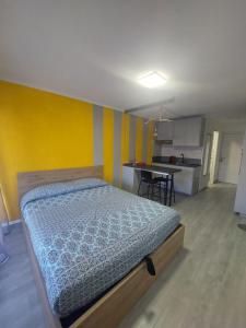 Una cama o camas en una habitación de Riviera Begonia Appartement - Parking Privé