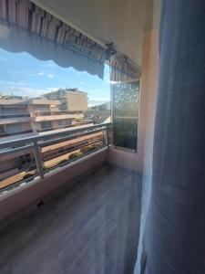 Un balcón o terraza en Riviera Begonia Appartement - Parking Privé