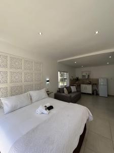 Ένα ή περισσότερα κρεβάτια σε δωμάτιο στο Seven on Cooper