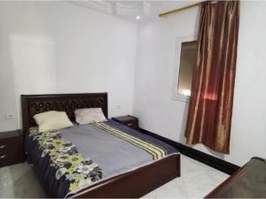 En eller flere senge i et værelse på La villa El RAIS