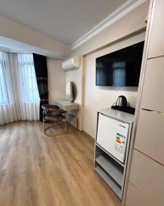 Nhà bếp/bếp nhỏ tại New Hotel Harbiye Studio