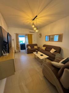 Μια τηλεόραση ή/και κέντρο ψυχαγωγίας στο Cosy Corner Apartment