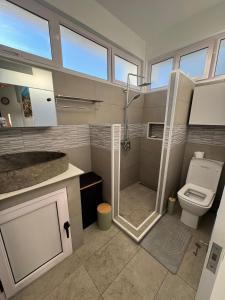 Ένα μπάνιο στο Cosy Corner Apartment