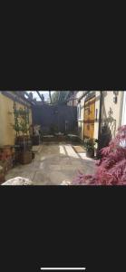 a view of a living room with a patio at The Old Hanging Gate Inn in Madeley