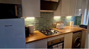 Η κουζίνα ή μικρή κουζίνα στο Troon Beachcombers