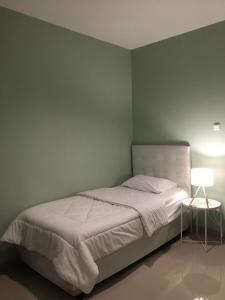 Giường trong phòng chung tại Aura Kostel