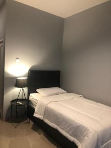 Giường trong phòng chung tại Aura Kostel