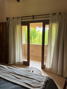 Postel nebo postele na pokoji v ubytování Villas Indigo Troncones