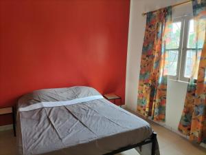 En eller flere senge i et værelse på Chez Khassim