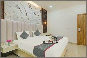 Ένα ή περισσότερα κρεβάτια σε δωμάτιο στο The Sapphire Crown