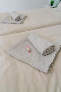 Ένα ή περισσότερα κρεβάτια σε δωμάτιο στο Ferienwohnung Emilia am Wörthersee