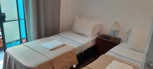 Ένα ή περισσότερα κρεβάτια σε δωμάτιο στο Atardecer en el Río