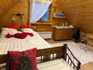 Postel nebo postele na pokoji v ubytování Norieši