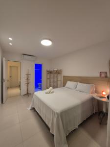 Una cama o camas en una habitación de Casa Harmonie - Seu refúgio na melhor praia da Bahia 38 fotos más