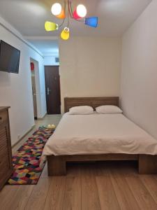 Ένα ή περισσότερα κρεβάτια σε δωμάτιο στο House of colors