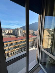 a view of a city from a window at LillaBloom in Nocera Inferiore