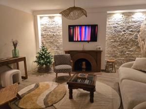 Posezení v ubytování Les chambres de la Marquise