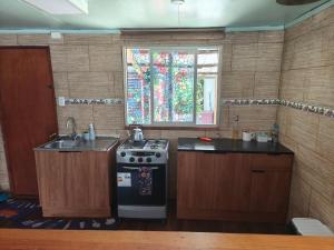 Kuchyň nebo kuchyňský kout v ubytování cabañas mateo 01