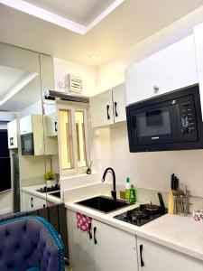 Kuchyň nebo kuchyňský kout v ubytování Albergo Nexus