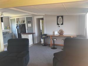 Et opholdsområde på The cottage + 10 billeder