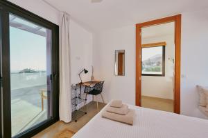 Giường trong phòng chung tại Casa del Aljibe - La Casa +68 ảnh