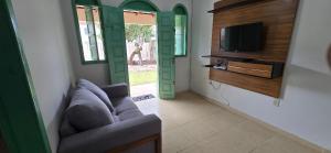 Et tv og/eller underholdning på Casa Temporada Maré Alta