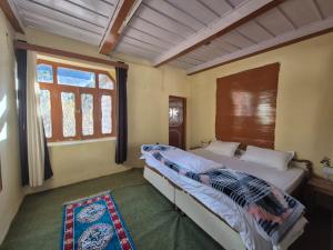 Postel nebo postele na pokoji v ubytování Rackham Stays + 8 fotografií