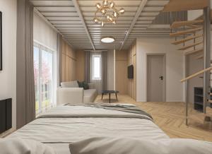 a bedroom with a large bed and a chandelier at Aqua & Wellness resort Alzbeta in Liptovský Mikuláš