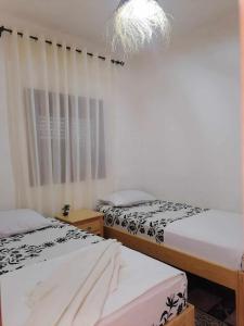 Postel nebo postele na pokoji v ubytování Le P’tit Coin D’Akchour