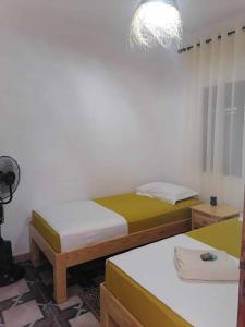 Postel nebo postele na pokoji v ubytování Le P’tit Coin D’Akchour