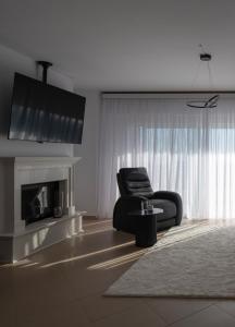 Et tv og/eller underholdning på Anore Apartment Evosmos Thessaloniki