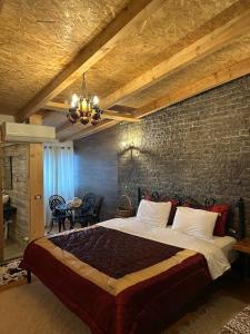 Ένα ή περισσότερα κρεβάτια σε δωμάτιο στο Hotel Devi