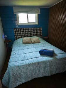 Una cama o camas en una habitación de cabaña Yapide2, puerto varas