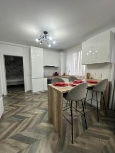 Kuchyň nebo kuchyňský kout v ubytování Vivo Residence II