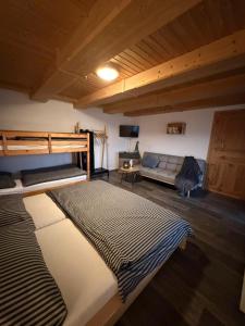 Ένα ή περισσότερα κρεβάτια σε δωμάτιο στο Apartmány Roudnice