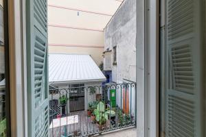 a view from a window of a balcony with plants at Wonderful Stay close to Garibaldi - Aircon in Nice