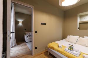 a bedroom with a bed and a living room at Wonderful Stay close to Garibaldi - Aircon in Nice