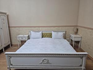 Ένα ή περισσότερα κρεβάτια σε δωμάτιο στο GX Hotel +13 φωτογραφίες