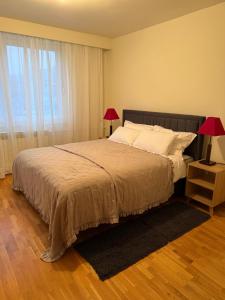 Postel nebo postele na pokoji v ubytování Apartman Lav Loris