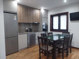 Η κουζίνα ή μικρή κουζίνα στο Casa Mucha - Rés do Chão e Andar +51 φωτογραφίες