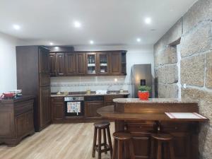 Kuchyň nebo kuchyňský kout v ubytování Casa Mucha - Rés do Chão e Andar