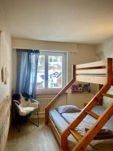 Postel nebo postele na pokoji v ubytování Best views and location in Leukerbad!